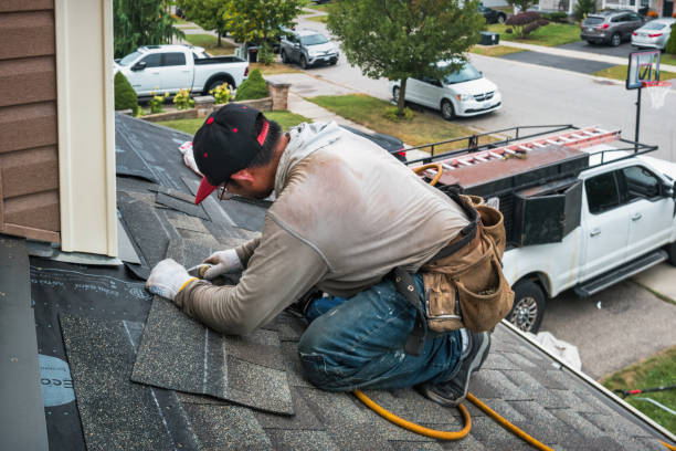 Professional Roofing technician working in La Habra, CA